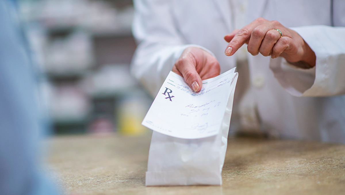 Legal Weed Makes Prescription Drugs Use Go Down, Study Finds: A woman doctor holding a filled prescription