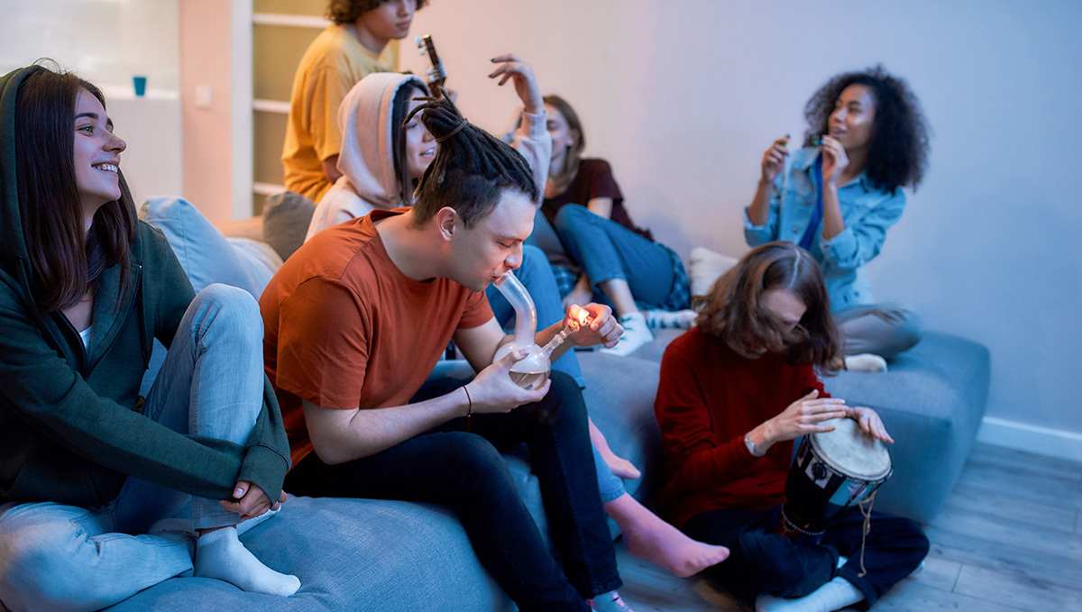 Buds or Booze? Gen Z Goes for the Healthier Option: A group of people in their early 20s partying with weed indoors