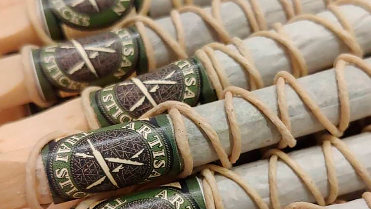 Learn how to make an all cannabis cigar (aka cannagar) wrapped in fan  leaves 